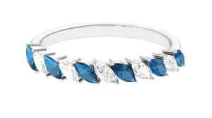 1 CT London Blue Topaz and Diamond Tilted Half Eternity Ring