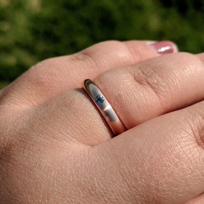 14k Rose Gold Wedding Ring with a 2.5mm Aquamarine Flush Set