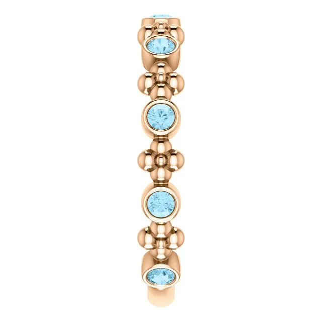 14KT GOLD 0.36 CTW ROUND AQUAMARINE BEZEL-SET BEADED FLORAL RING