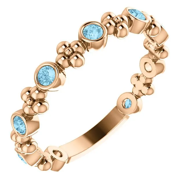 14KT GOLD 0.36 CTW ROUND AQUAMARINE BEZEL-SET BEADED FLORAL RING