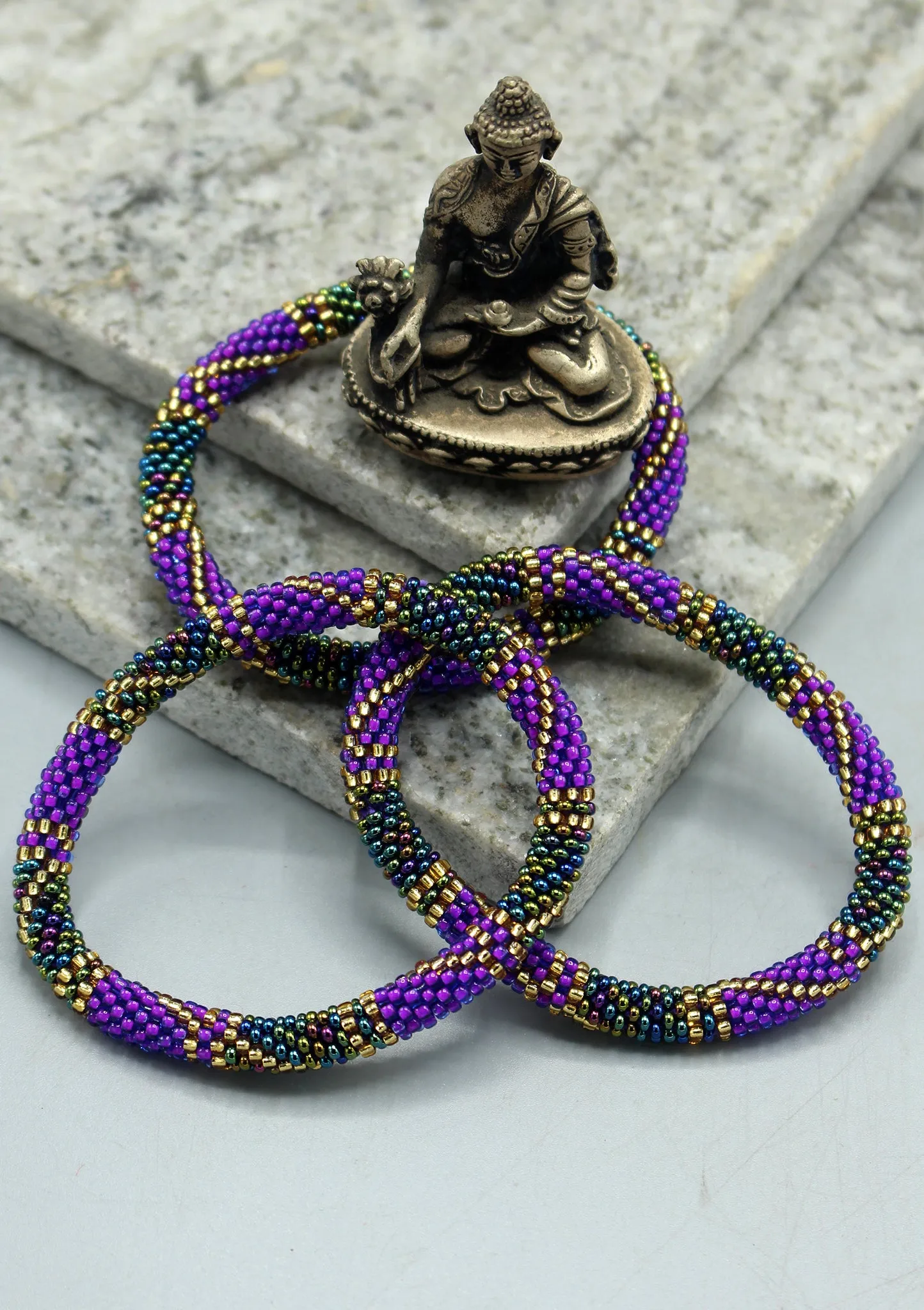 Bright Purple and Golden Beads Nepalese Roll on Bracelet