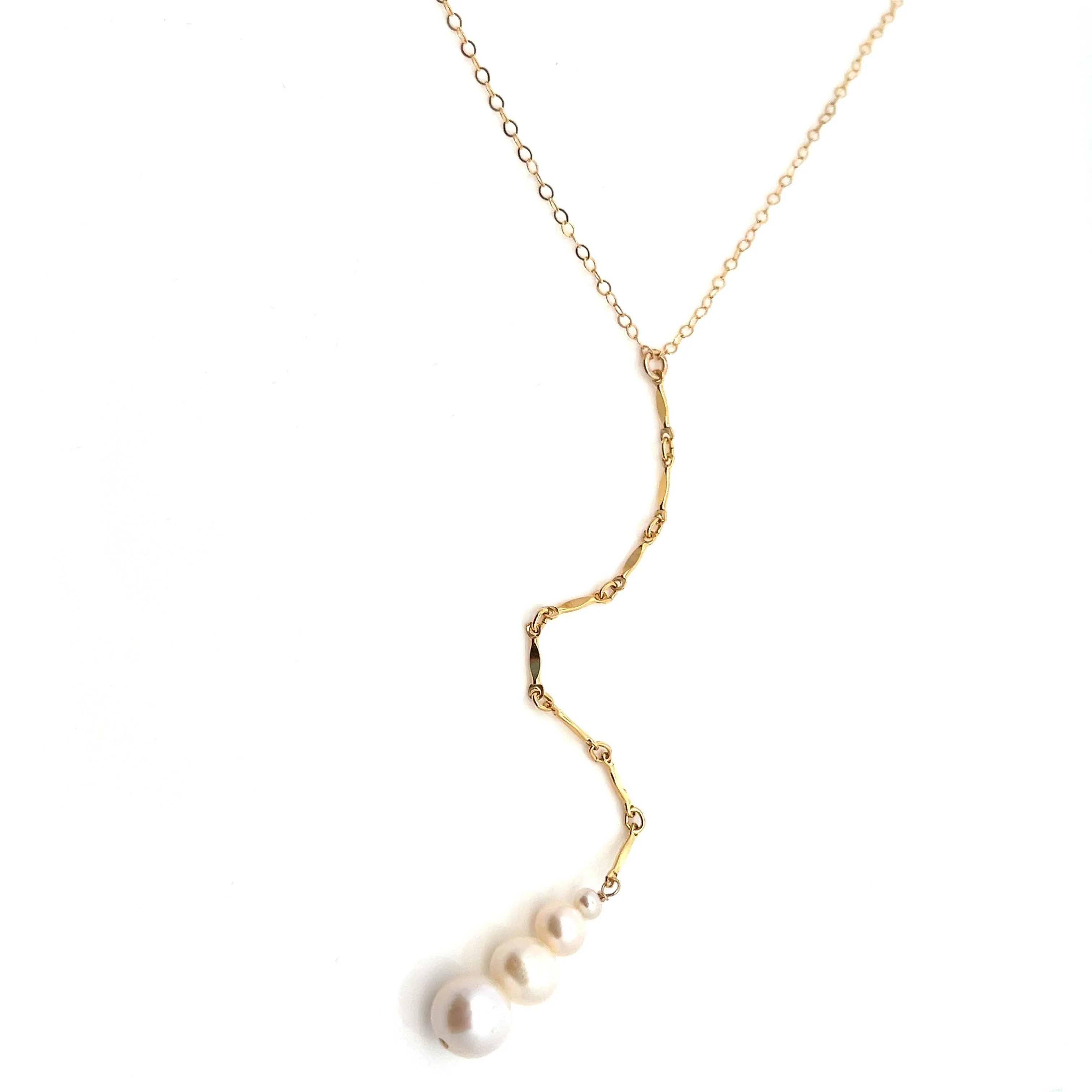 lariat y-necklace with graduated pearls & gold bar accents