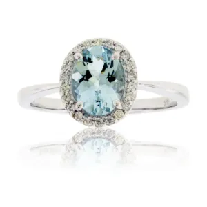 Oval Aquamarine and Diamond Halo Ring