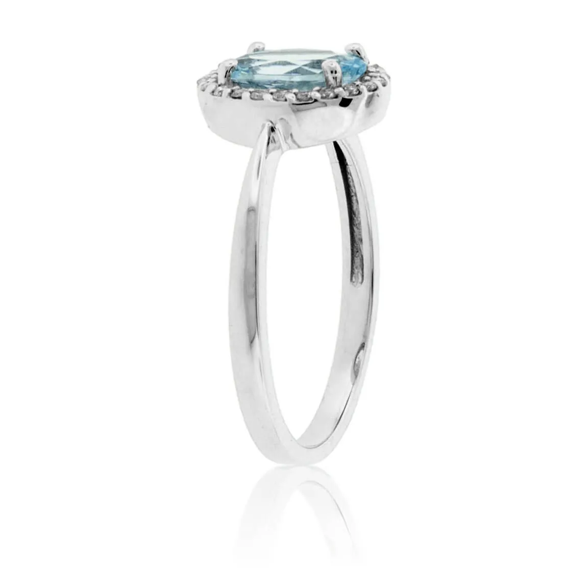 Oval Aquamarine and Diamond Halo Ring